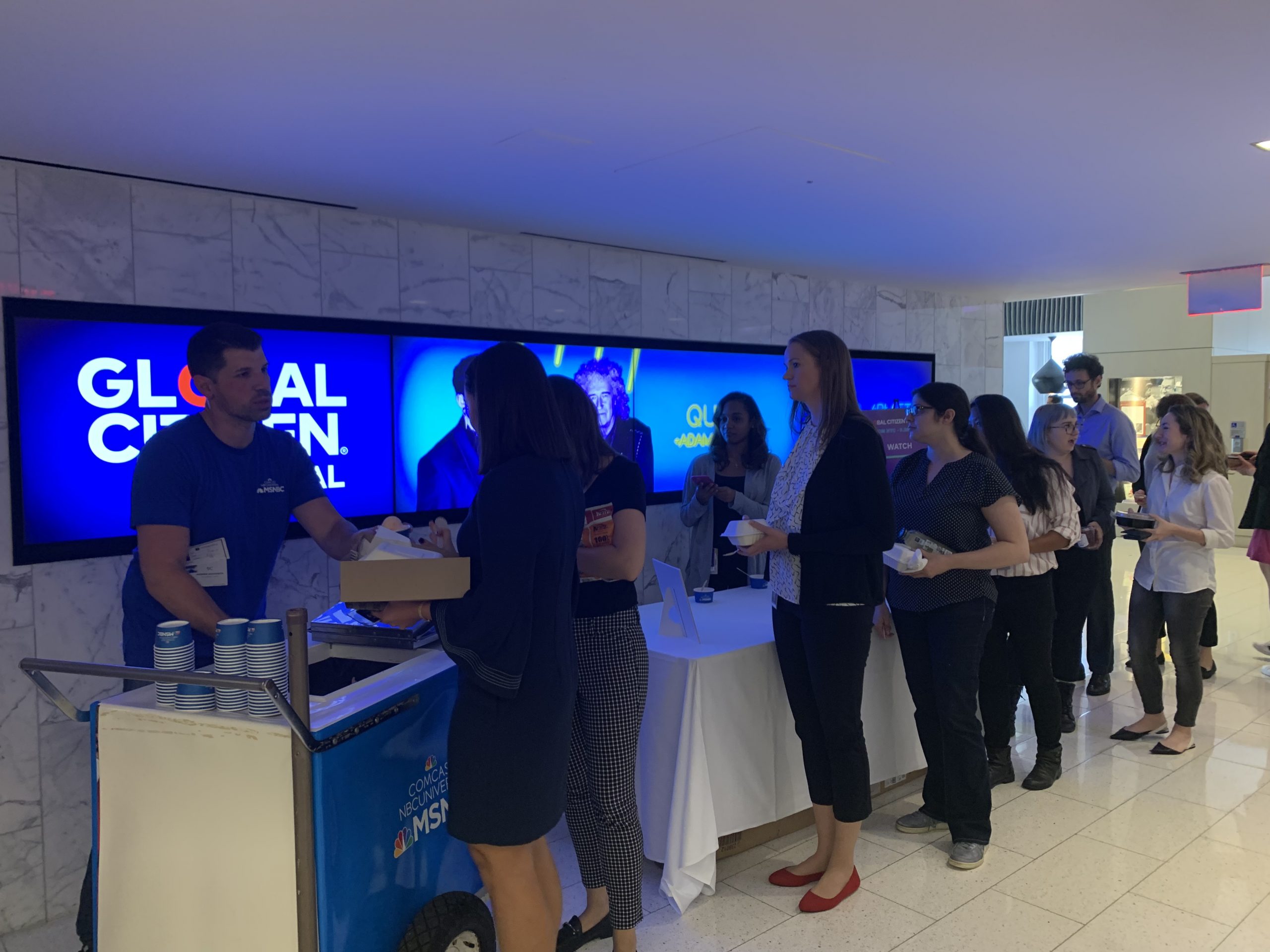 Andy's Italian Ice at an event with people lined up